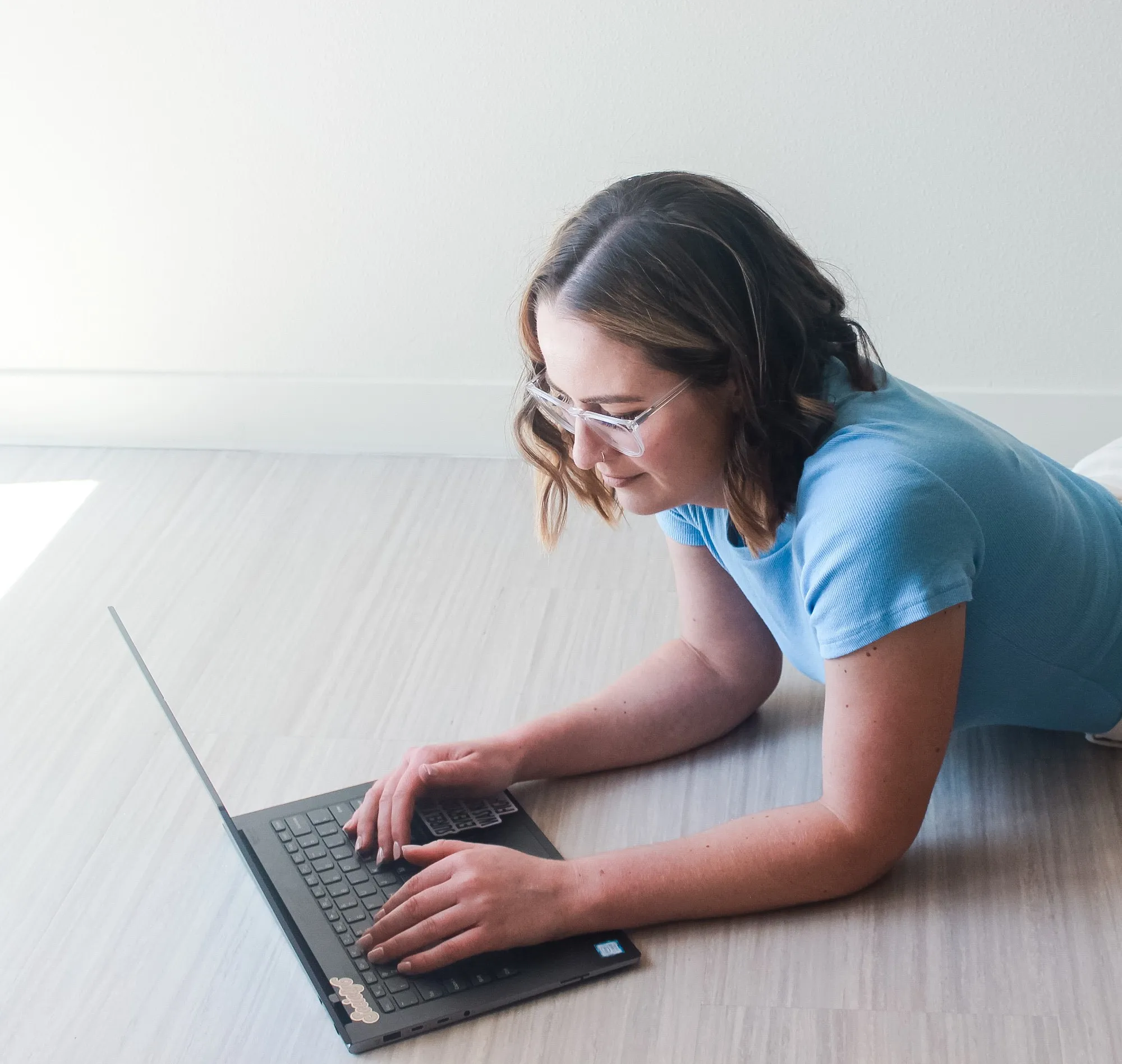 Woman working on laptop - The Pivot Playbook